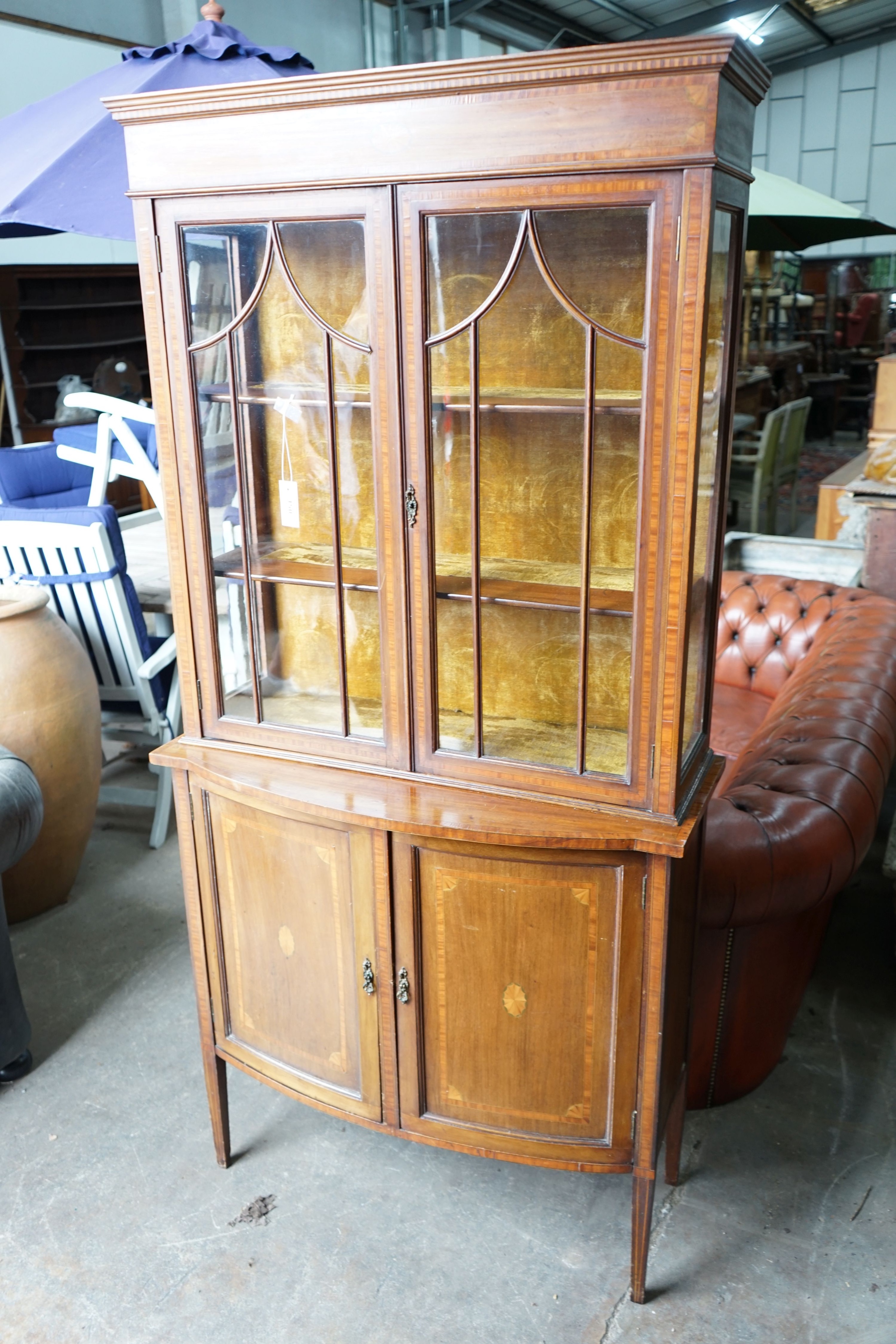An Edwardian inlaid and satinwood banded mahogany bowfront display cabinet, width 92cm, depth 42cm, height 191cm